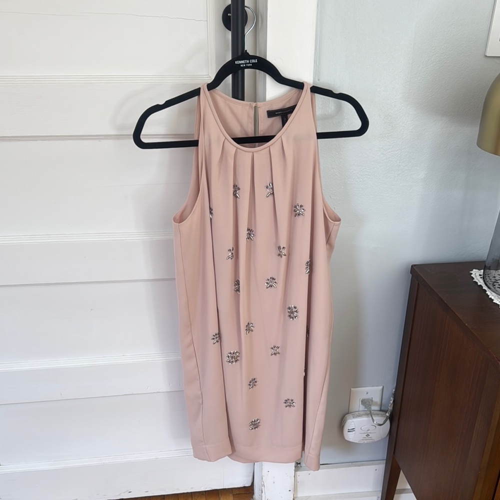 BCBGMacazria Elegant peach colored Sleeveless Dress with pockets.